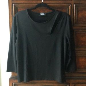 Black Tuzzi top with stylish slit at shoulder